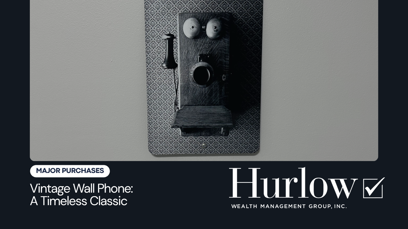 An aluminum vintage phone sign hanging on a kitchen wall