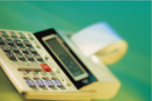 Finance Adding Machine Celebrating The End Of A Successful Tax Season — HCM Wealth Advisors
