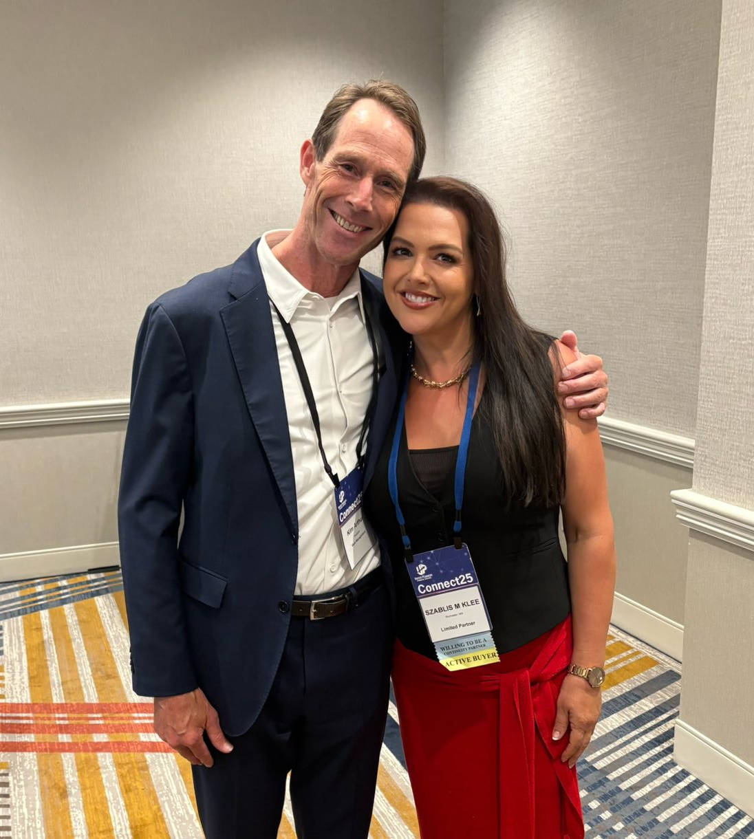 Szablis and a peer at a financial planning conference