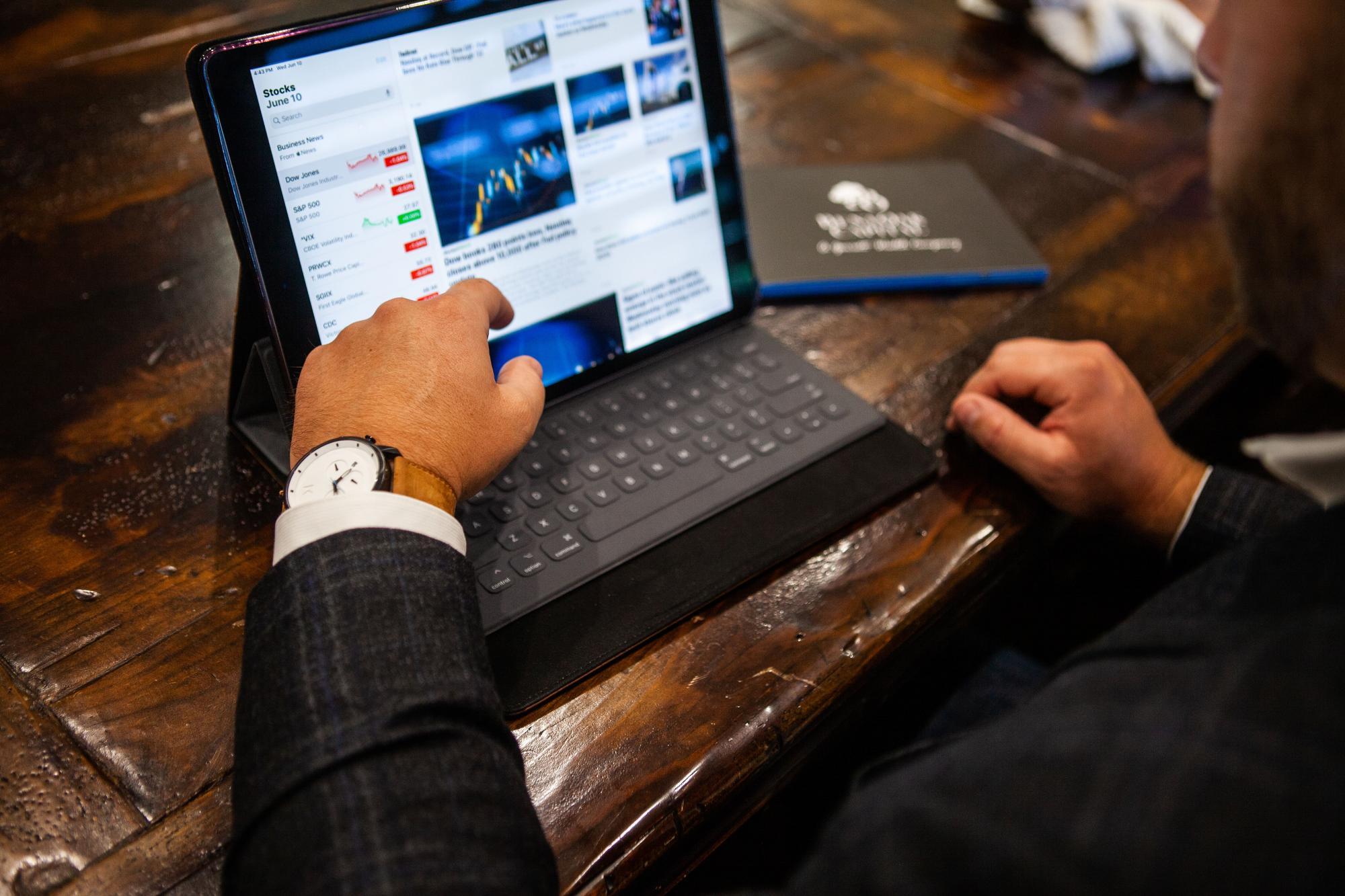 Man with laptop at a desk