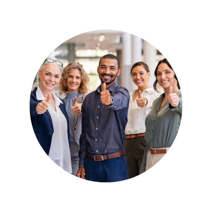 5 neatly dressed people smiling and showing a thumbs up