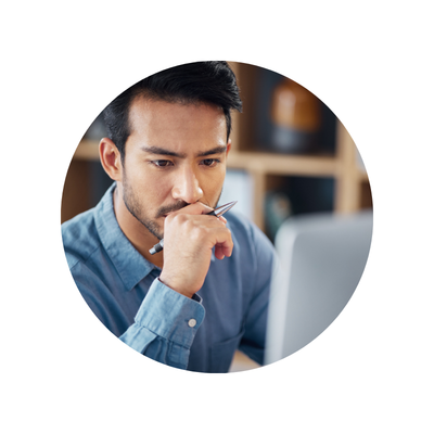 Young investor, thinking and looking at computer, holding pen