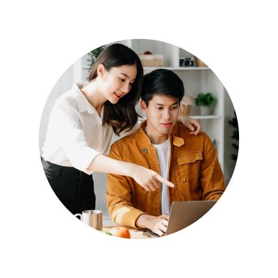 young couple reviewing computer screen