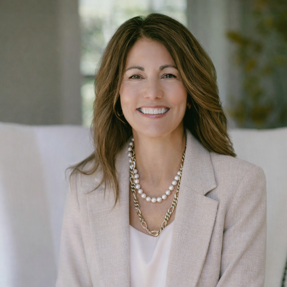 a woman smiling at camera